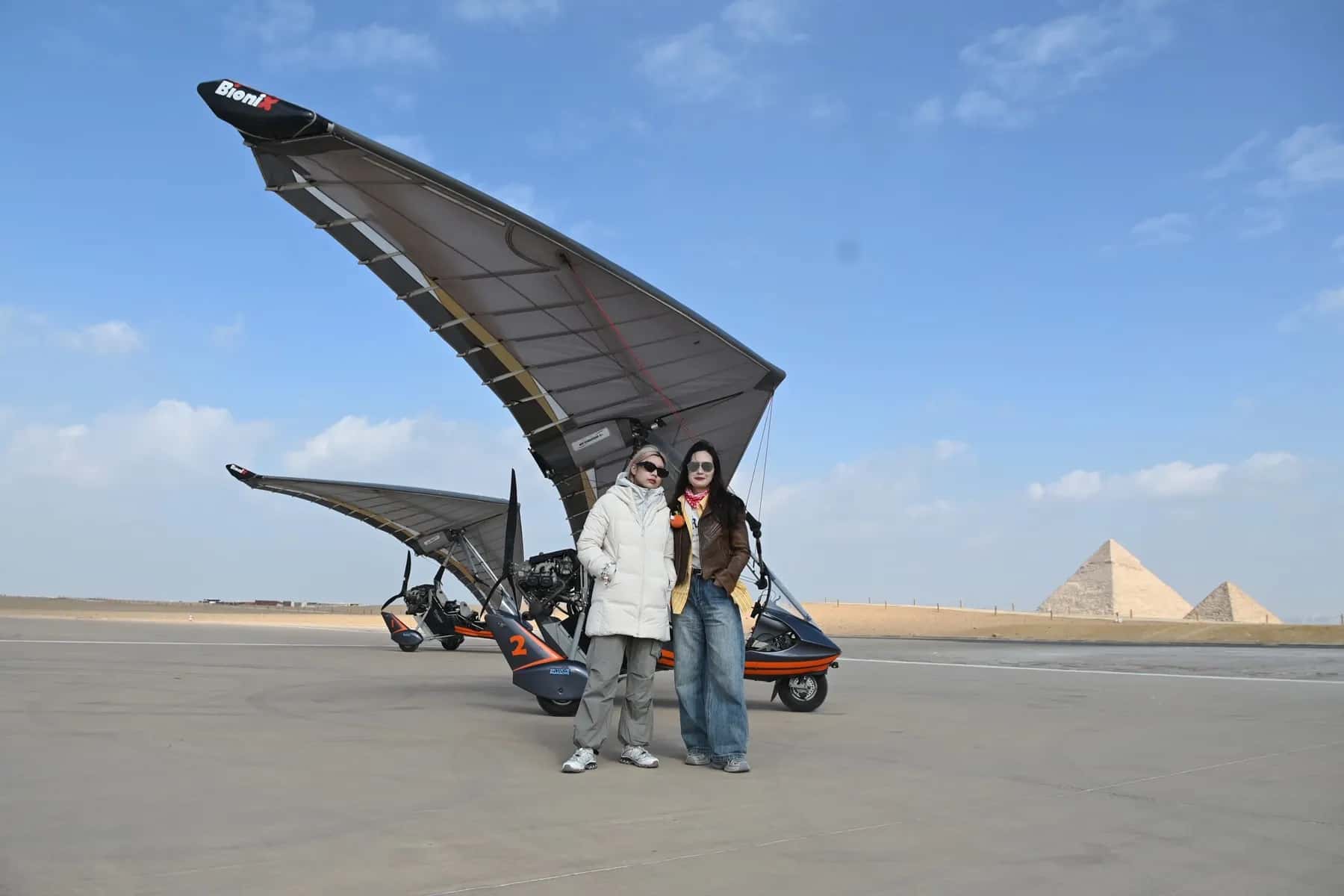 Guests with a Wonder Wing microlight on the Giza Plateau
